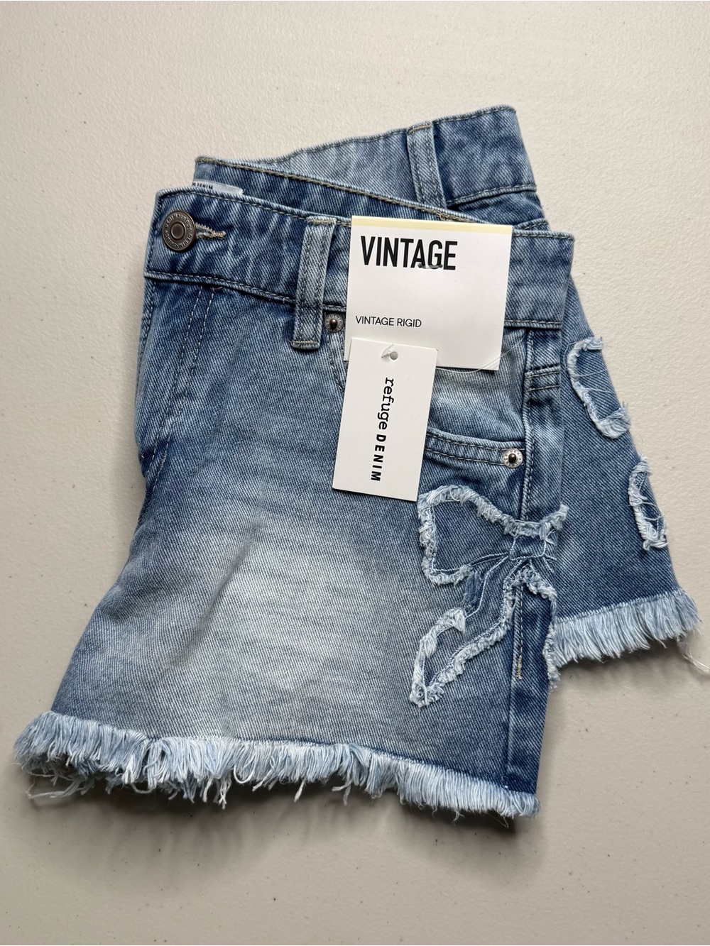 NWT Juniors Blue Denim Shorts Bow Patches Size 0